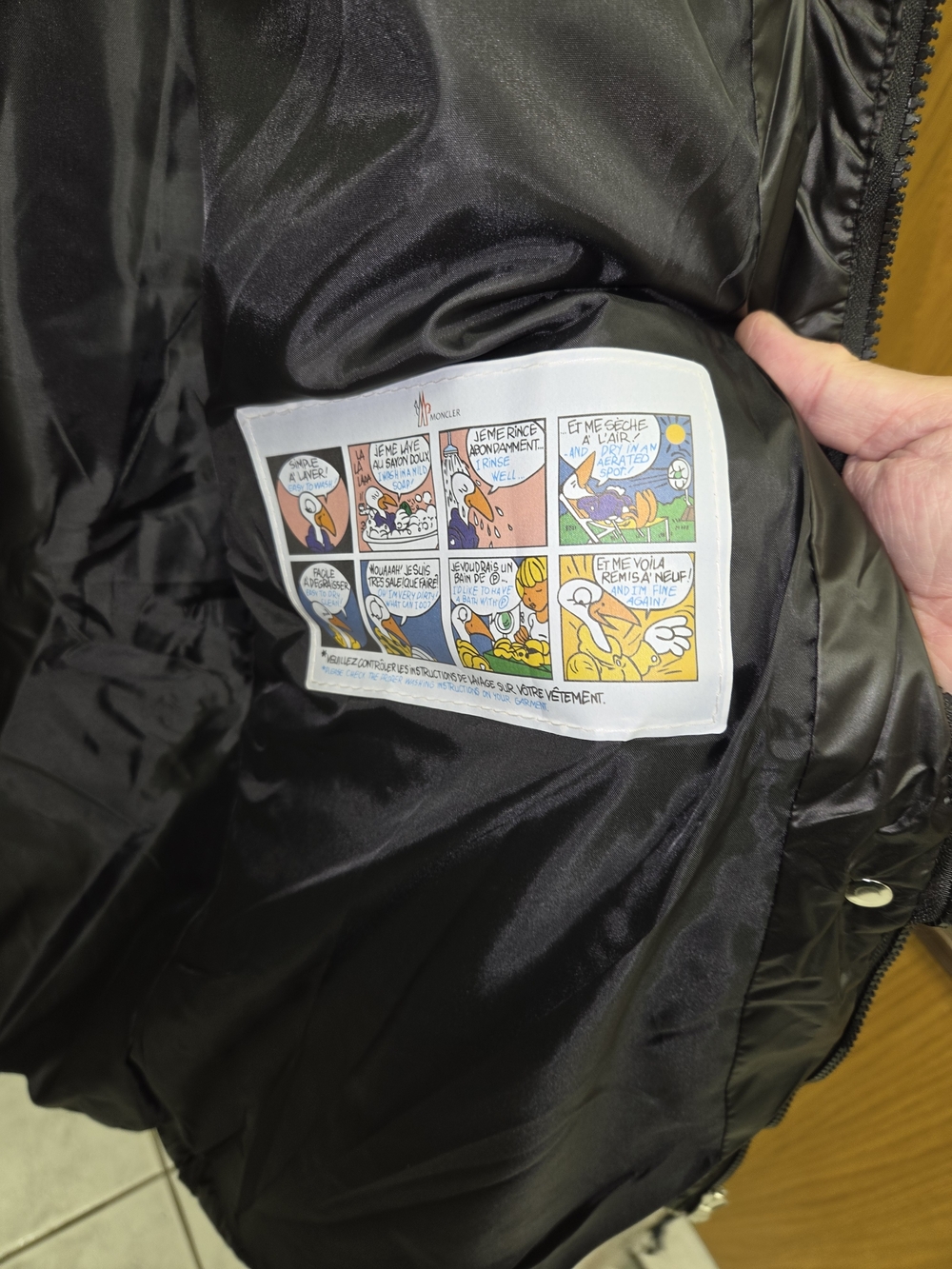 Moncler Kids Black Shiny Puffer Jacket with Comic Care Label